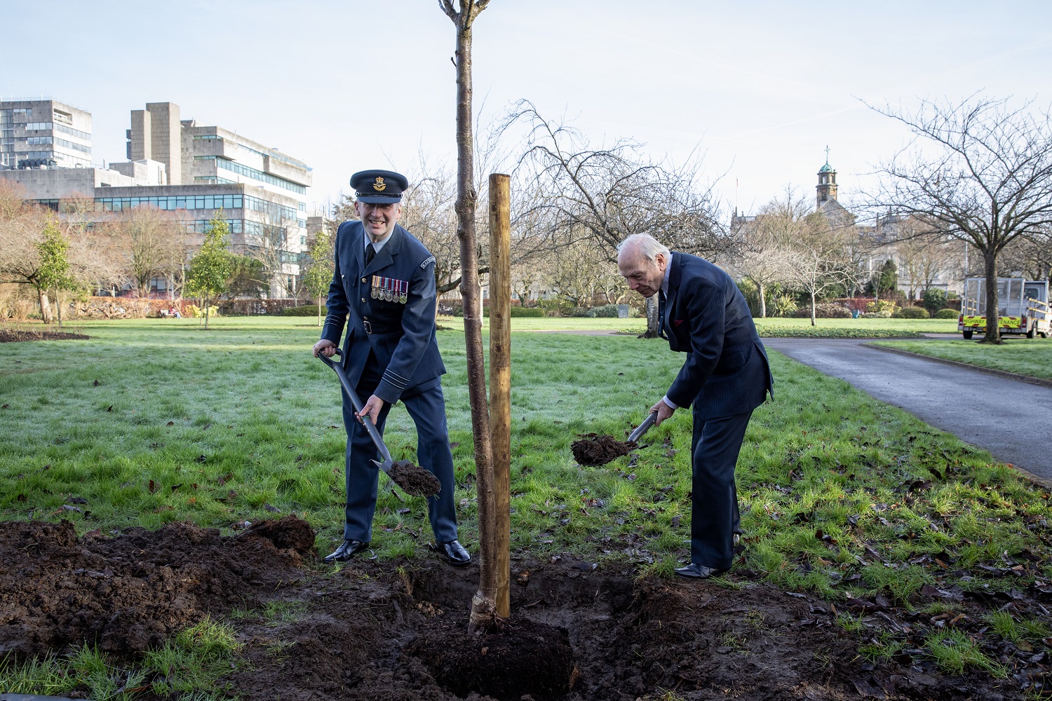 Photo: Wing Commander Olly Walker, Officer Commanding, 614 Sqn and Group Captain (retd) Richard Mighall, Trustee Chairman of the Royal Auxiliary Air Force Foundation plant the Flowering Cherry.